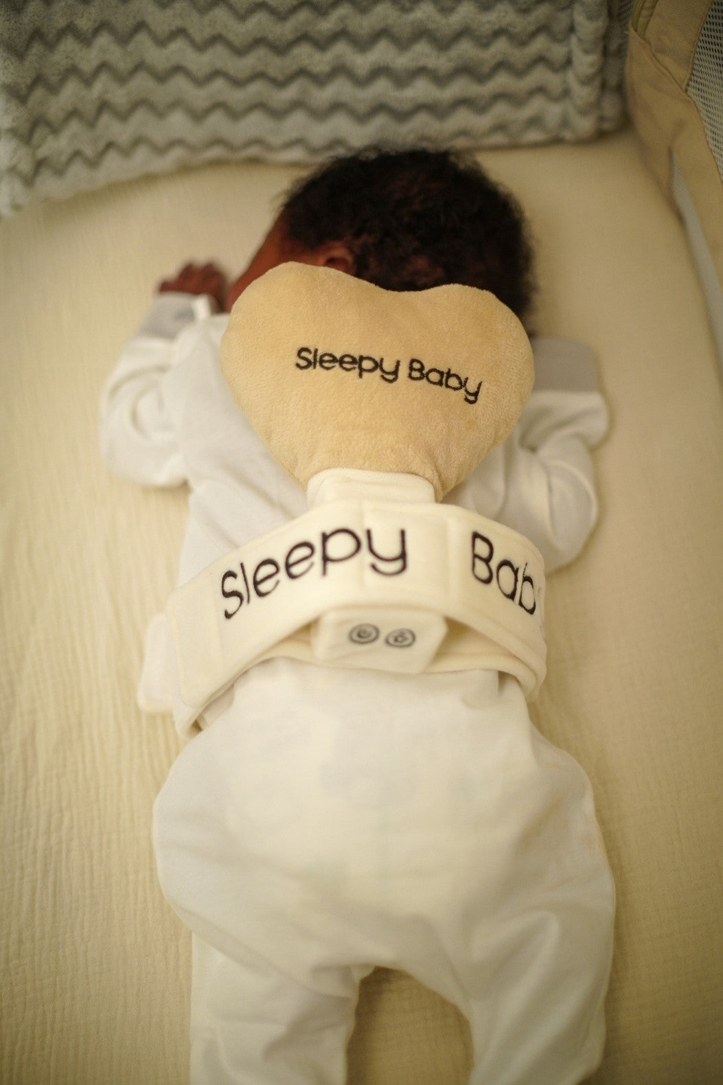Peaceful baby sleeping on heart-shaped pillow | Sleepy Baby