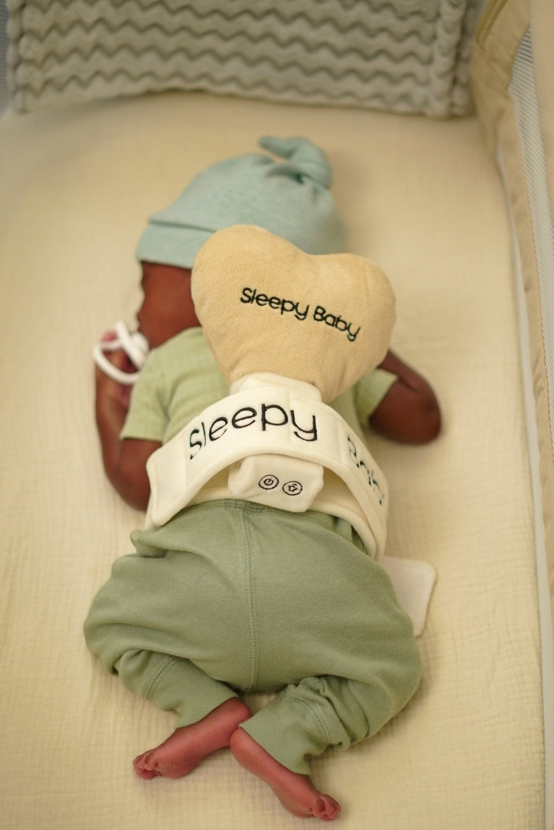 Peaceful baby sleeping on heart pillow with soft bedding | Sleepy Baby